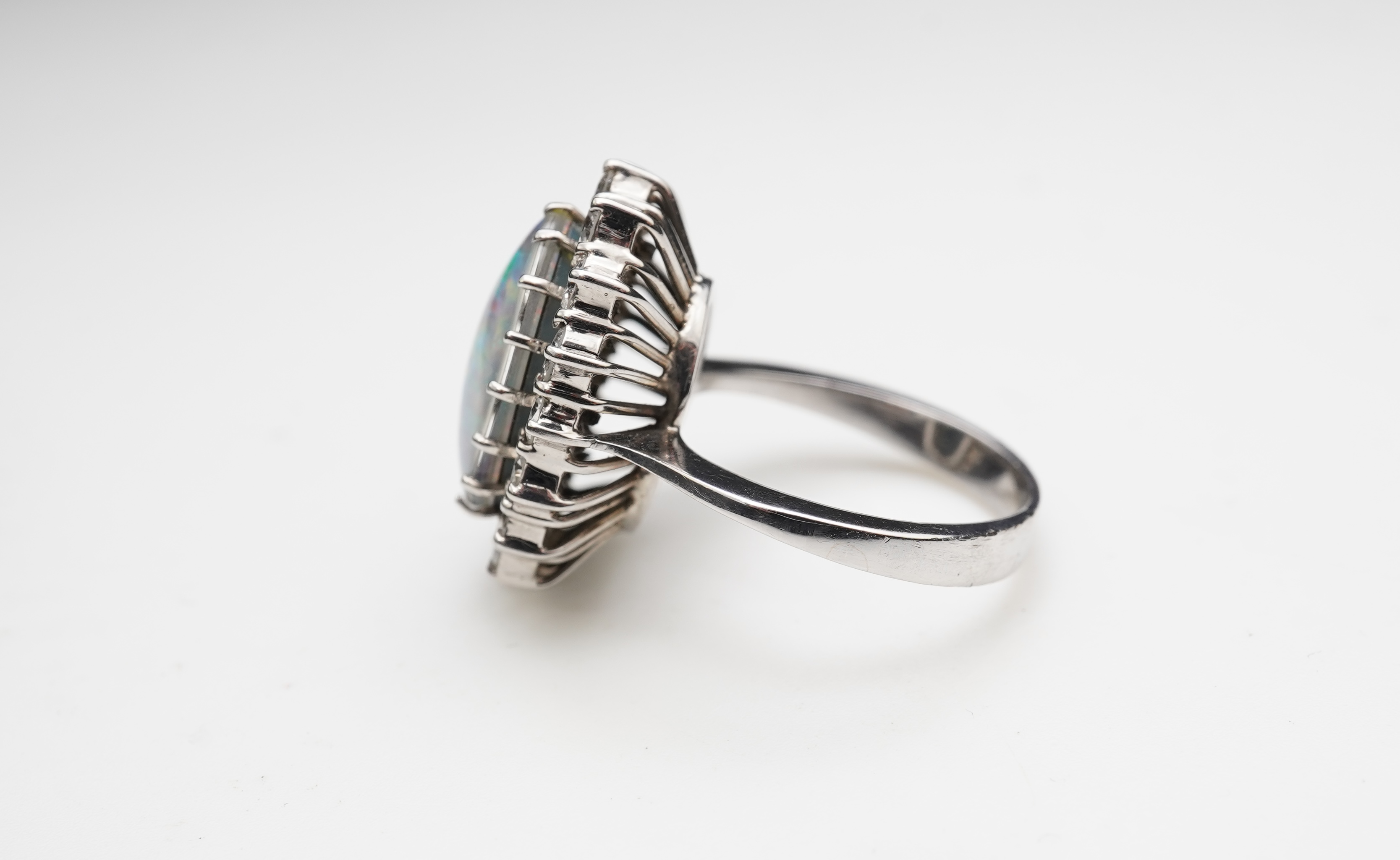 An opal triplet and diamond ring